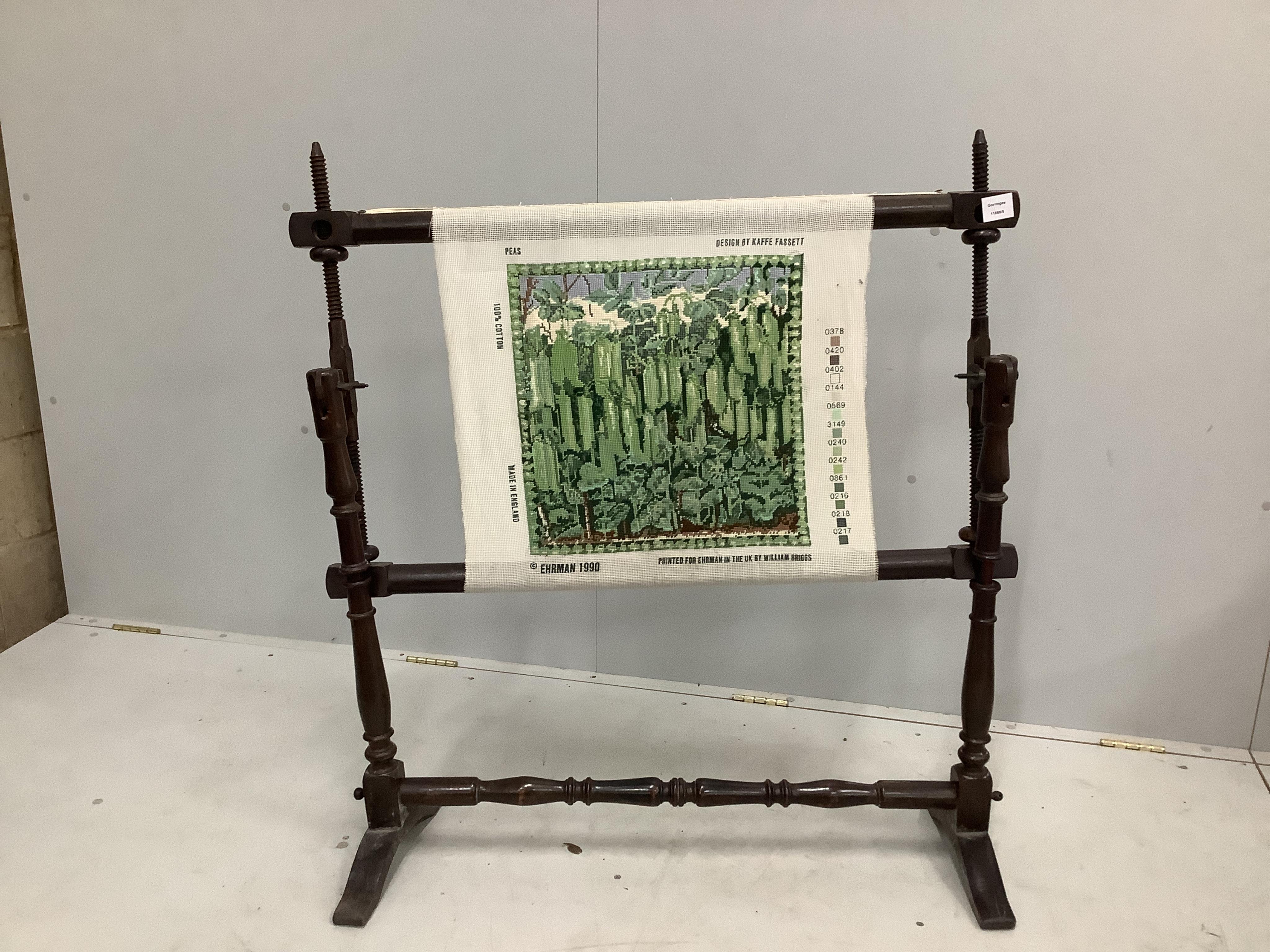 A turned wood embroidery loom with tapestries and threads, width 110cm, height 115cm. Condition - good